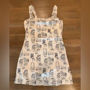 Beige sleeveless dress with Black cafe Print